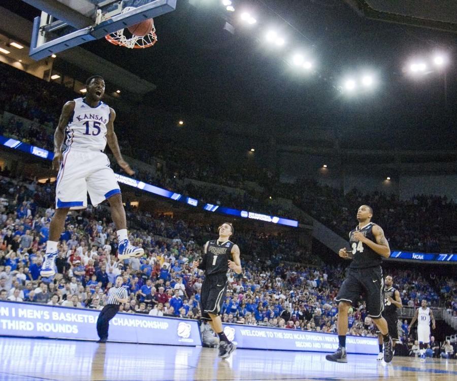 Kansas Jayhawks guard Elijah Johnson (15) celebrates a break-away dunk against the Purdue Boilermakers in Sunday's third-round NCAA men's basketball tournament action on March 18, 2012 at the CenturyLink Center in Omaha, Nebraska. (Shane Keyser/Kansas City Star/MCT)