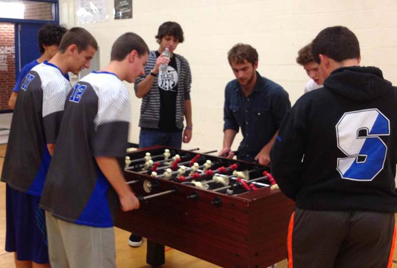 Seniors Jack Duff and James Robotham play a mad game of foosball at the first 5th Quarter event of the year. Be sure to join in the action at the upcoming 5Q events 10/11 and 10/18.