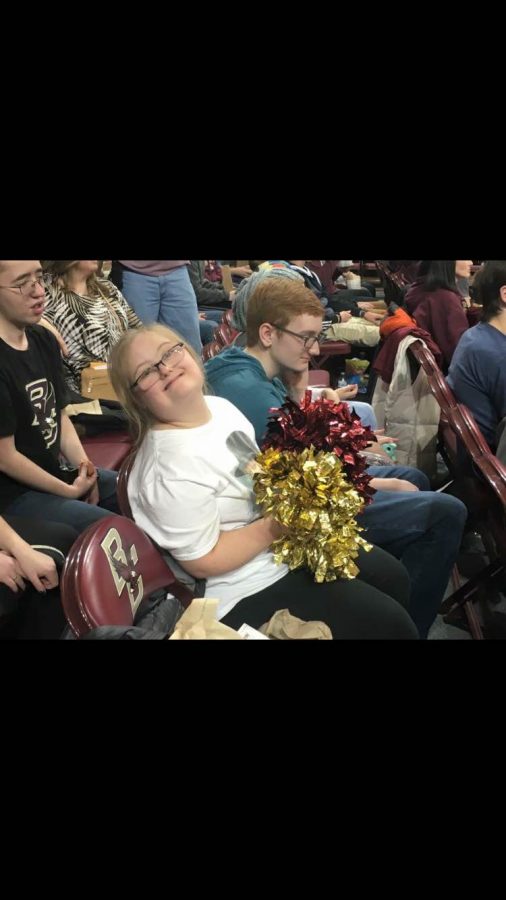 Boston College cheerleaders give away pom poms to SHS students