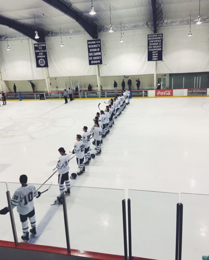 The SHS Boys hockey team lines up for the playing of the National Anthem before one of their Division II South sectional tournament games. Photo courtesy of Mike McMath. 