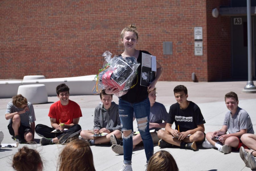 Erika Houghton-Steidle learned she won tickets to Taylor Swift's July concert while she was in art class 