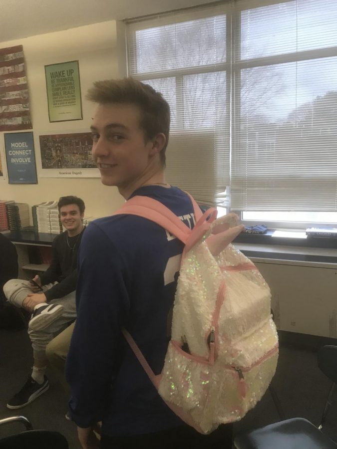 As+a+result+of+placing+second+to+last+in+a+Fantasy+Football+league%2C+SHS+senior+Ian+Loftus+is+forced+to+use+a+sparkly+unicorn+backpack+at+SHS