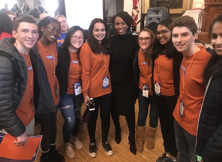 Janhvi Trehan poses with Ayanna Pressley and members of Project 351 at Faneuil Hall in Boston during this year's Launch Day