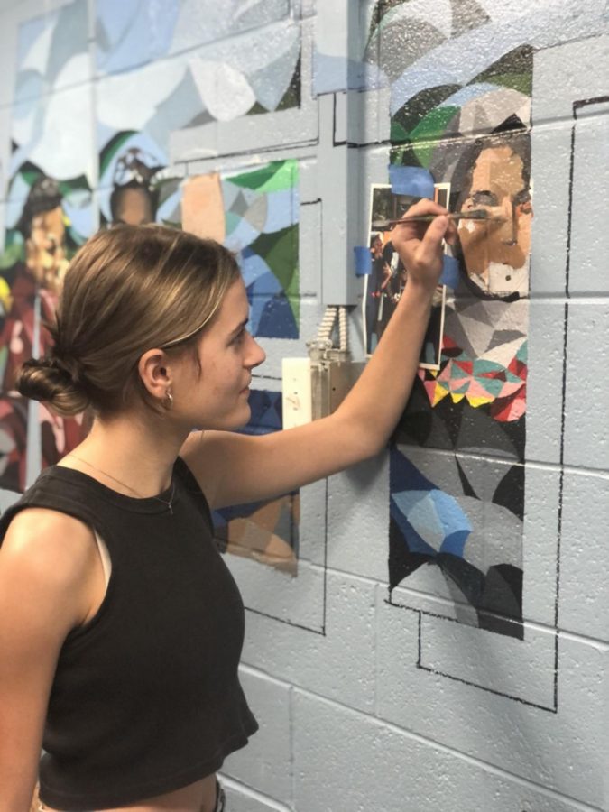 Sydnie+Marshall+has+enjoyed+the+process+of+creating+a+mural+at+SHS