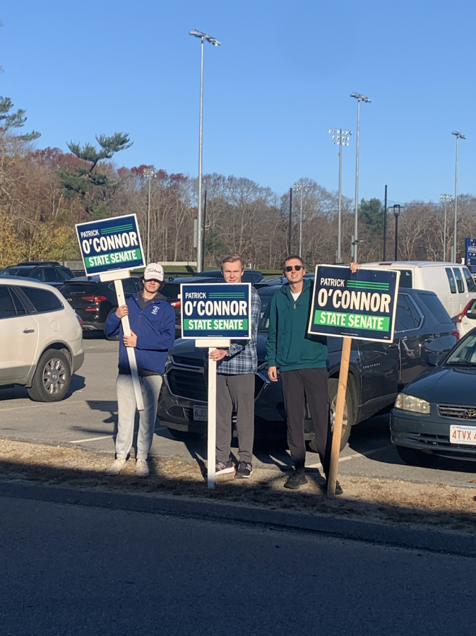 SHS seniors Andrew Belson, Micheal Johnson and Victor Bowker hold signs for Patrick O'Connor 