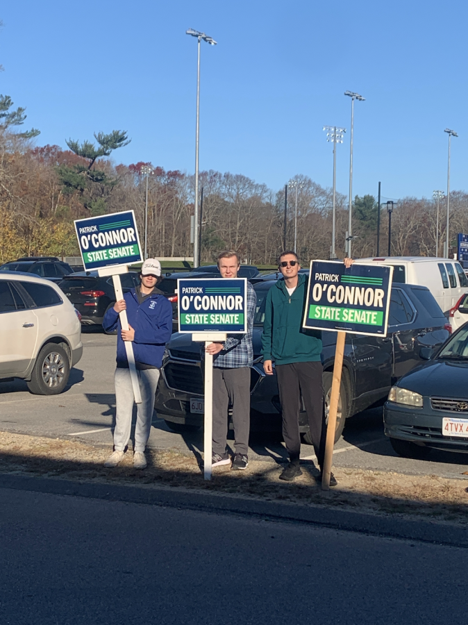 SHS seniors Andrew Belson, Micheal Johnson and Victor Bowker hold signs for Patrick OConnor 