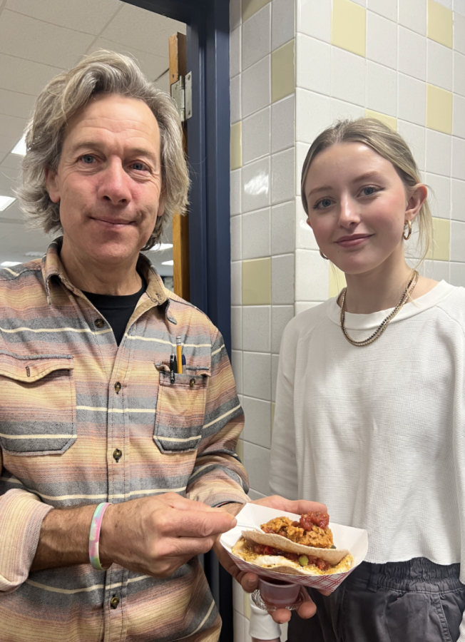 Jon Belber from Holly Hill Farm and SHS senior Lauren Esker 
