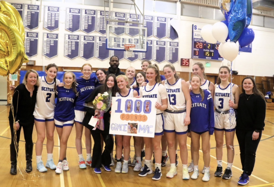 The SHS Girls Basketball Team Celebrates McNamaras 1,000 points!