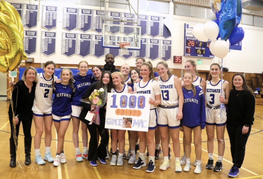 The SHS Girls Basketball Team Celebrates McNamara's 1,000 points!