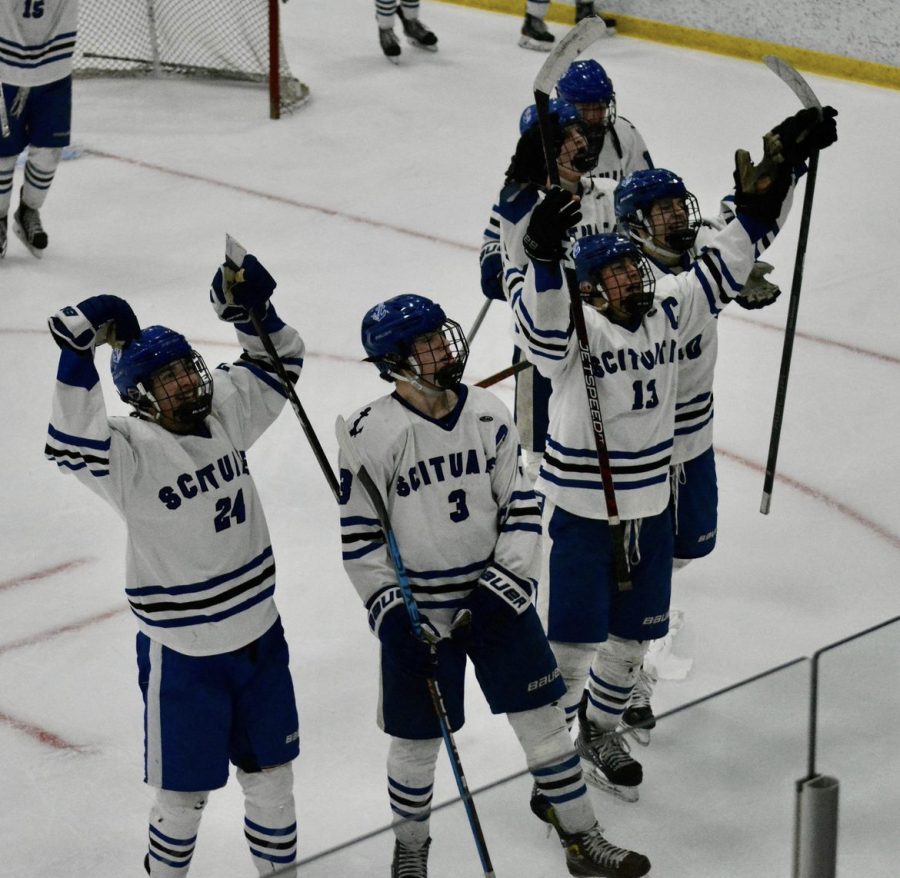 The SHS hockey team thanks fans for their support during Saturday's game against Watertown