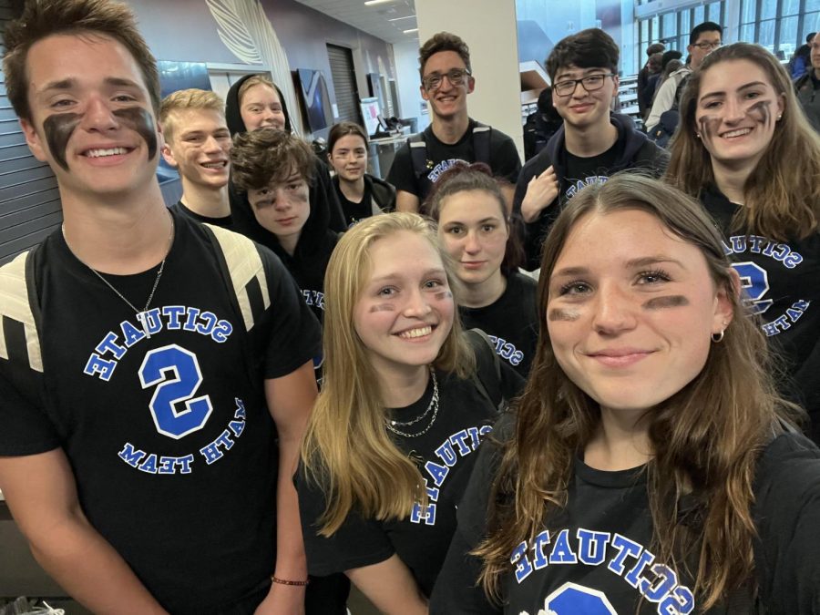Lilly George captures the Math Teams successful season during a selfie taken at Sharon High School