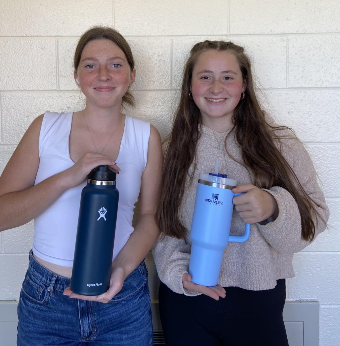 SHS juniors Trinity Rothwell (left) and Nora Gosnell (right) boast their favorite water bottles. 