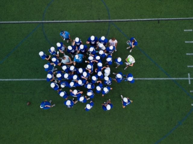 The Sailors huddle during night practice on Wednesday, November 29th