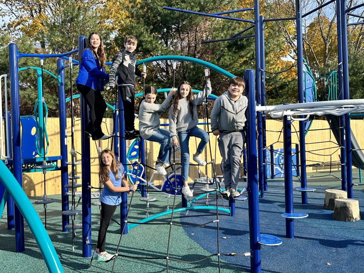 Fifth Grade Jenkins Elementary School Student Ambassadors take an inaugural climb on their new playground
