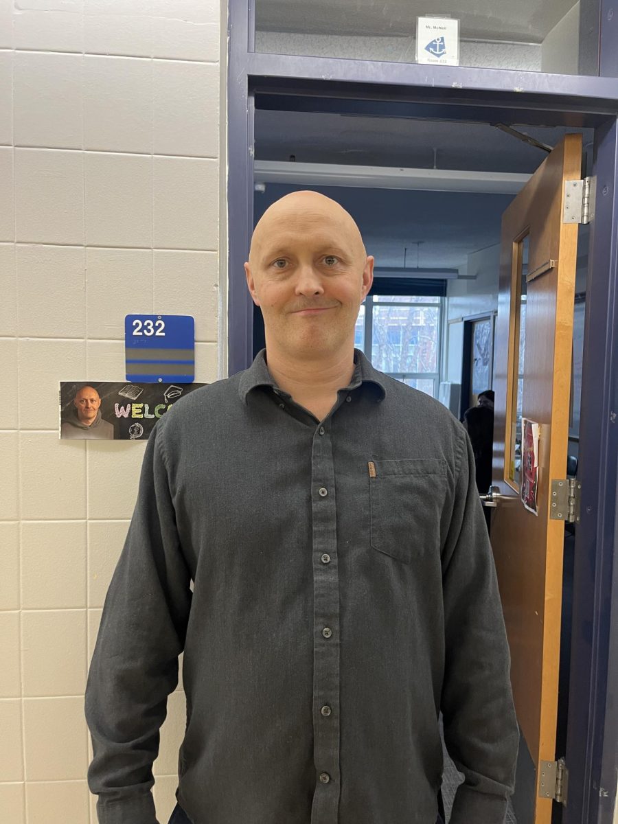 Mr. McNeil balances work, family and yoga.