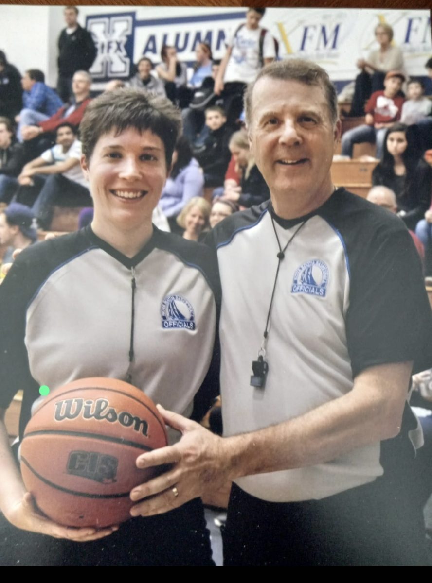 Daughter and Father Referee duo Nicole Weiner and Peter Phipps before co-officiating a basketball event together in Nova Scotia, Canada.