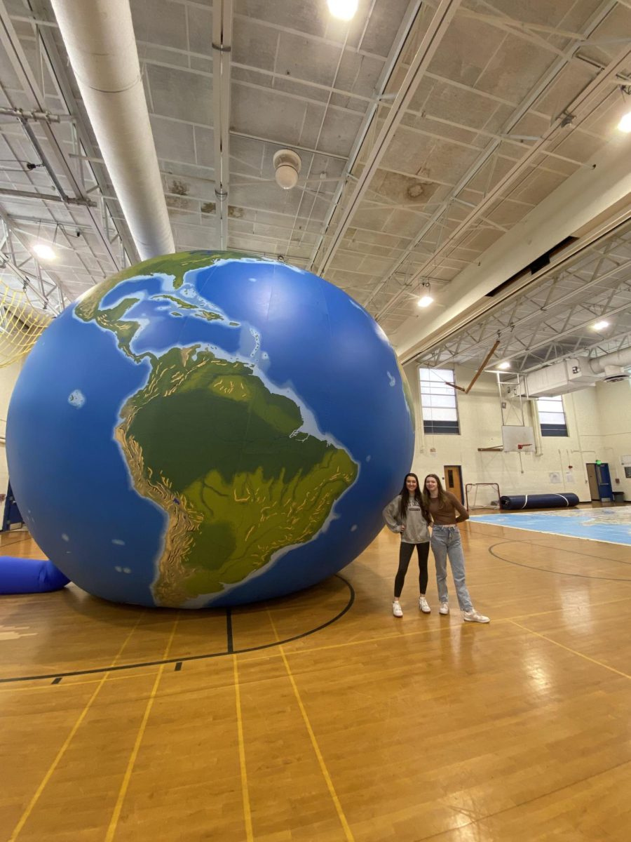 SHS+juniors+Bridget+Norris+%28left%29+and+Allie+Ryan+%28right%29+were+among+the+students+who+experienced+the+inflatable+globe+provided+by+Bridgewater+State+University