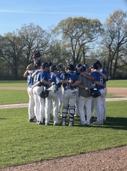 The Scituate Sailors connect before defeating the North Quincy Raiders, 3-1 on May 7th. 
