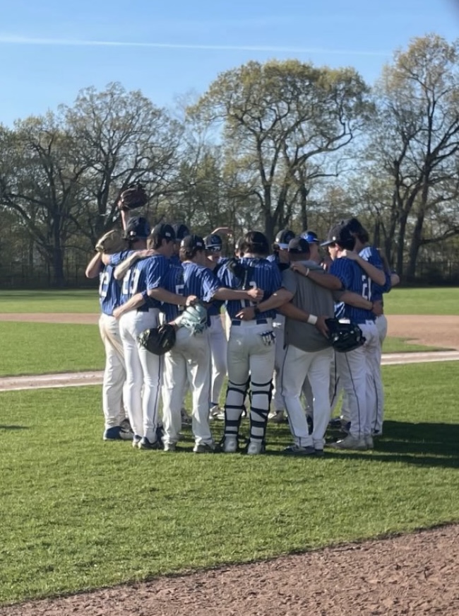 The+Scituate+Sailors+connect+before+defeating+the+North+Quincy+Raiders%2C+3-1+on+May+7th.+