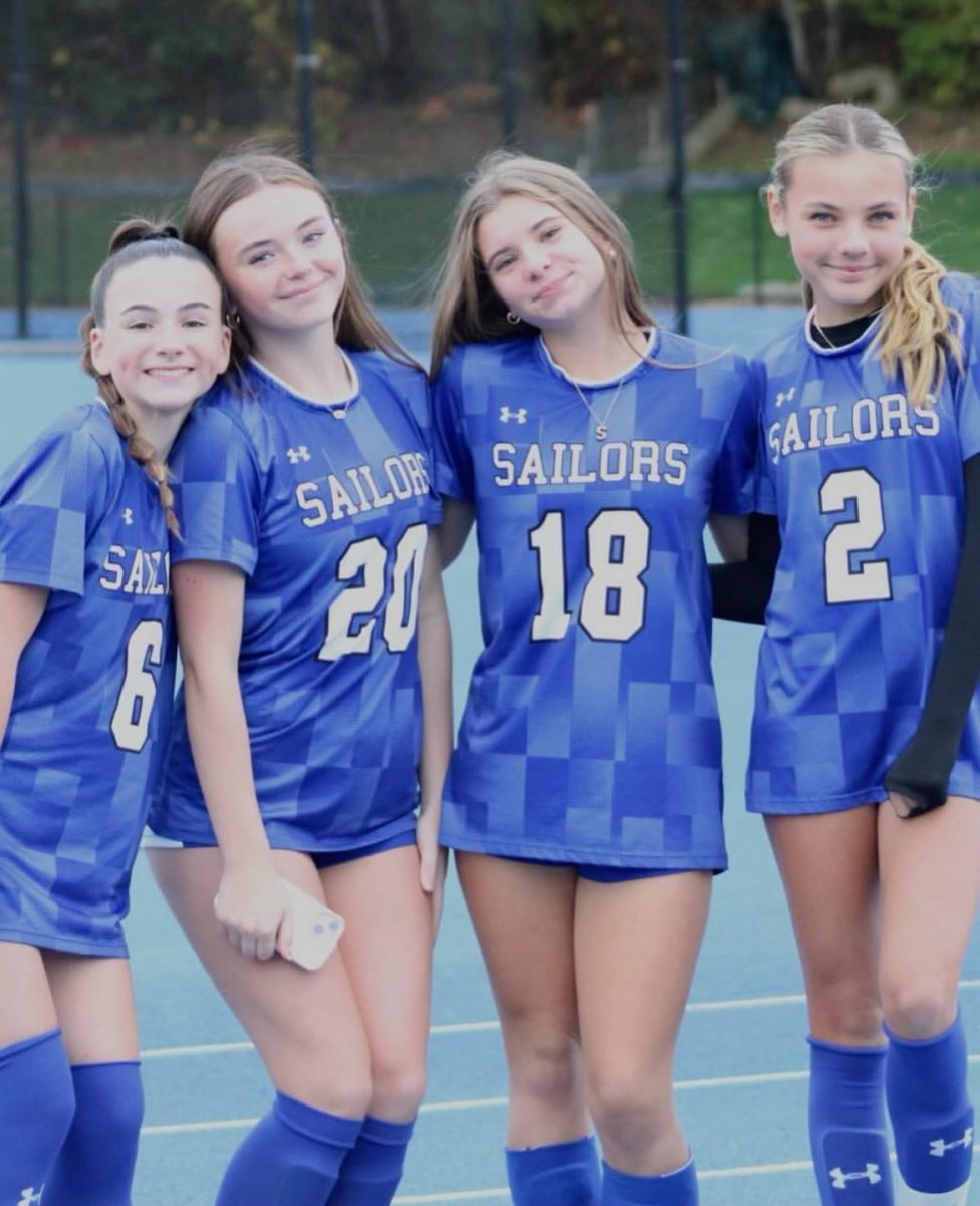 Freshmen varsity soccer players (l-r) Ainsleigh O'Brien, Sydney McLean, Siena Griffin, Grace Kroeger
